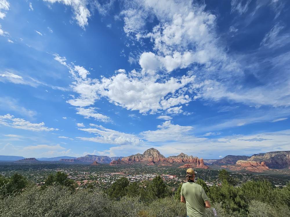 Matt looking over the Sedona valley under a huge sky