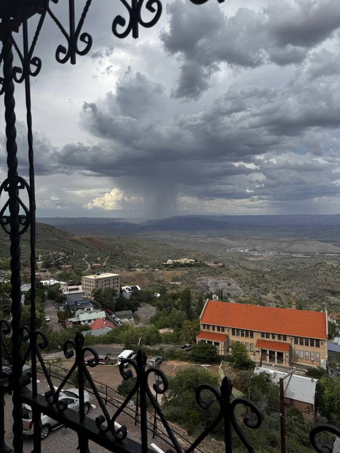 Storm clouds through the balcony ironwork