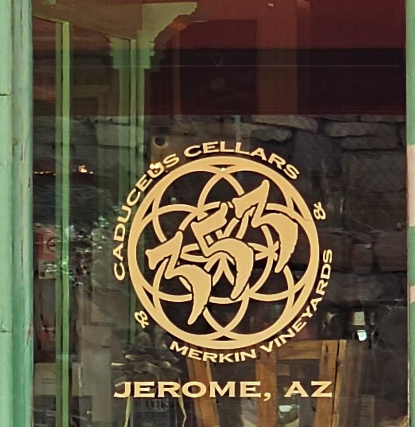 Etched glass door of Caduceus Cellars, Jerome AZ