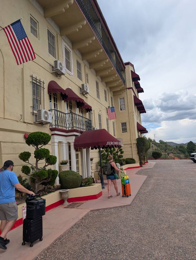 Rolling luggage into the Jerome Grand Hotel